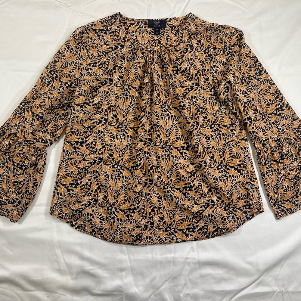 Women's J.Crew bell-sleeve blouse with a giraffe print pattern